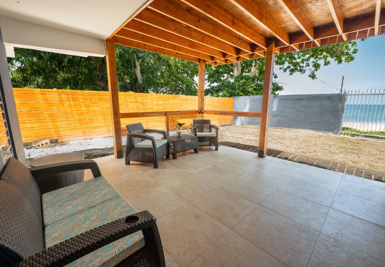Apartment in Mayaguez - Oceanfront Retreat w/ Terrace, Direct access to Beach & BBQ