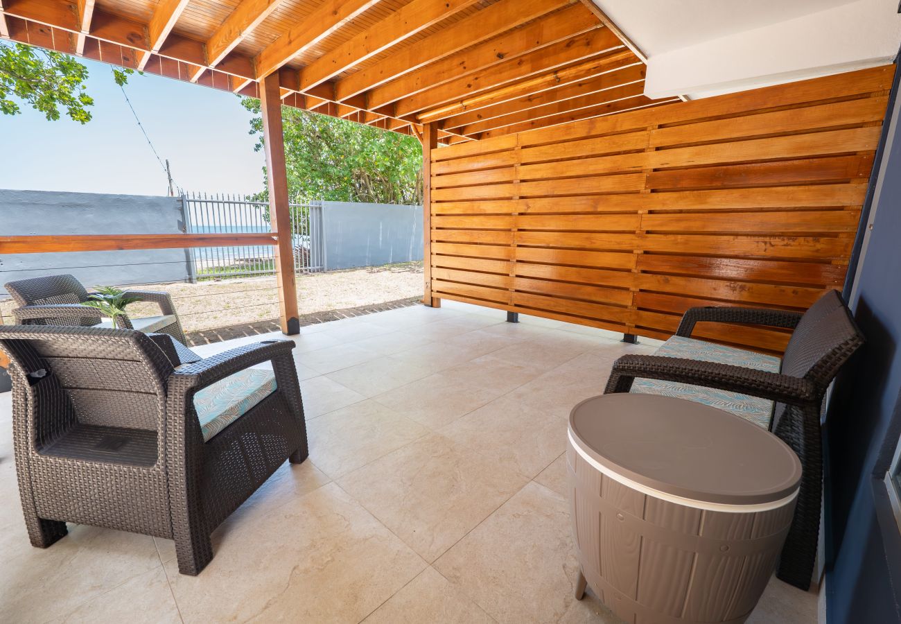 Apartment in Mayaguez - Oceanfront Retreat w/ Terrace, Direct access to Beach & BBQ