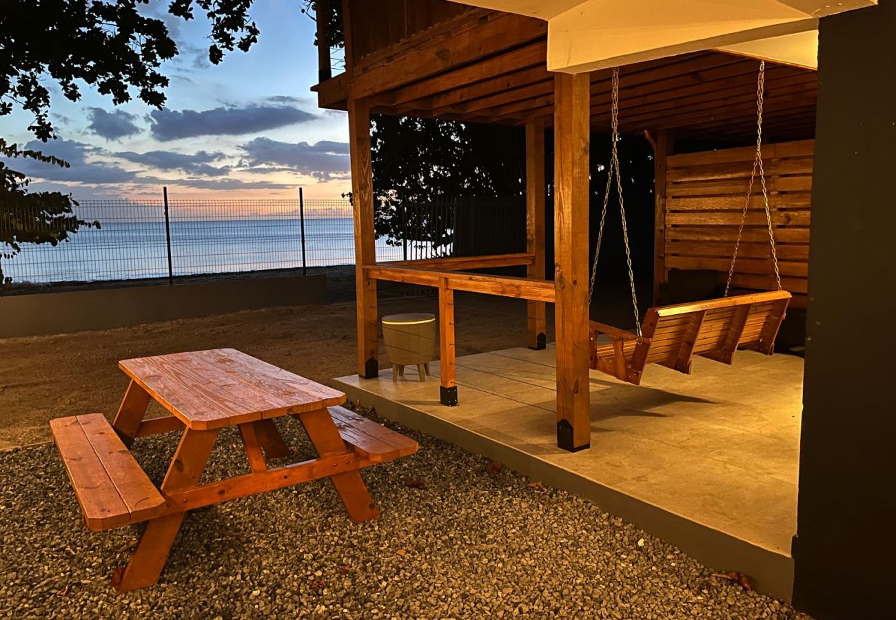 Apartment in Mayaguez - Oceanfront Retreat w/ Terrace, Direct access to Beach & BBQ