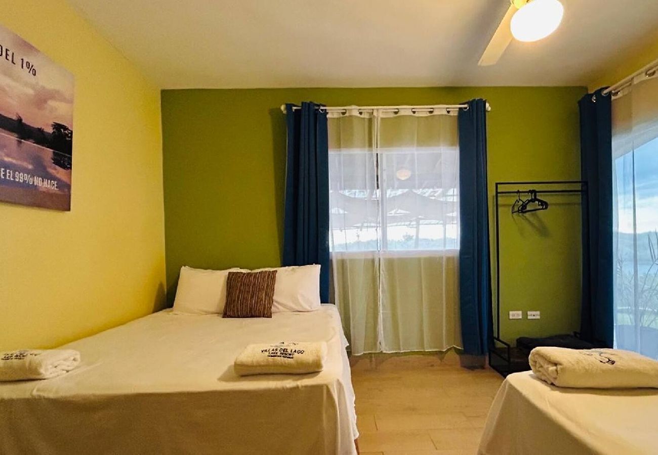 Rent by room in El Caimito - Villas Del Lago Resort – Family Suite | Upper Floor